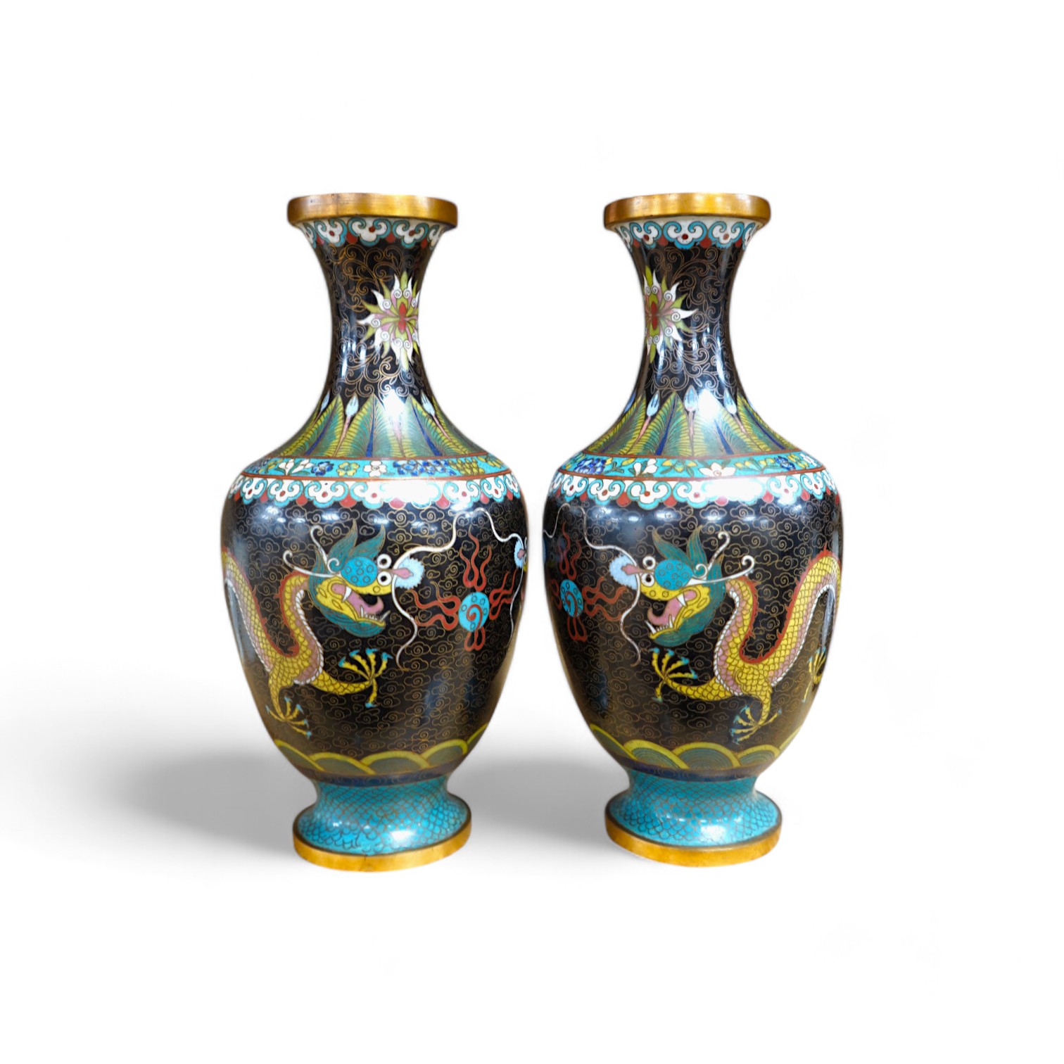 A pair of Chinese cloisonné black enamel ground vases, 23cm high. Condition - good.